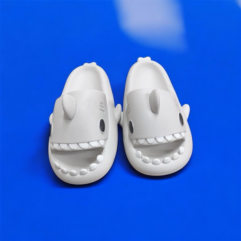 Men’s “The Cloudies’ size 11 slip one New never worn.